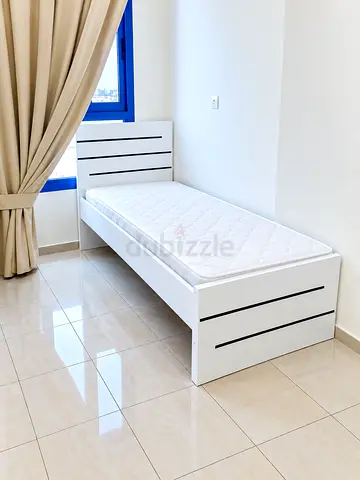 Brand new single size wooden Bed including mattress available