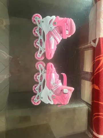 Pink adjustable inline roller skates - kids size,