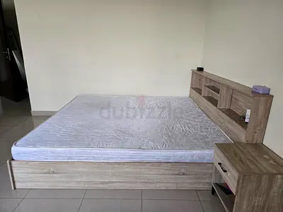 Bed + mattress + night stand + dressing table + stool