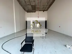 A premier, expansive commercial showroom for rent in Muwaihat 3, Ajman, featuring an area of ​​1
