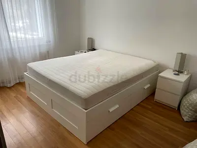 *IKEA BRIMNES Queen Bed + Mattress – AED 800*

IKEA BRIMNES queen-size bed frame in white with *four