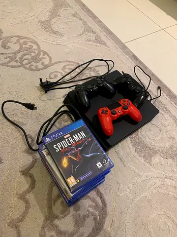 PlayStation 4 Slim with 3 Controllers and Games (Good Working Condition)