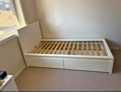 IKEA Brand single bed with  mattresses and 2 storage drawers neat and clean available