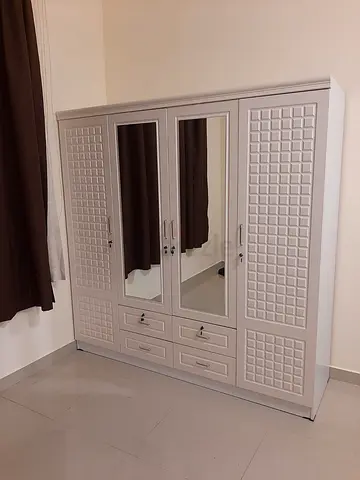 Light grey 4-door mirrored wardrobe with drawers - good quality