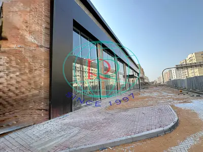 BRAND NEW SHOWROOM WITH MEZANINNE FLOOR AVAILABLE ALONG MALEHA ROAD IN INDUSTRIAL AREA 15 NEAR AL SHAMSI MEDICAL CENTRE
