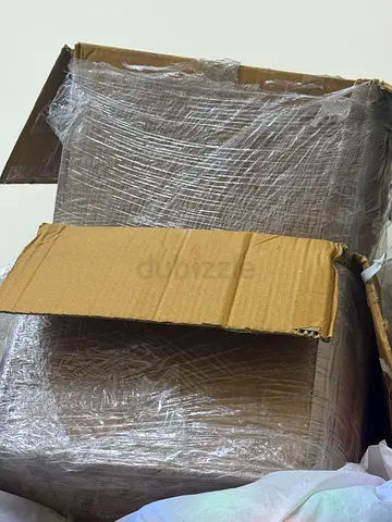 Cardboard boxes with cover wrap
