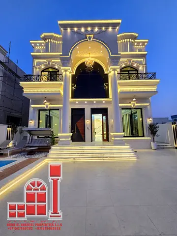 Classic-style villa for sale in Mowaihat 2, close to all amenities and the Saudi German Hospital, freehold ownership available to all nationalities.