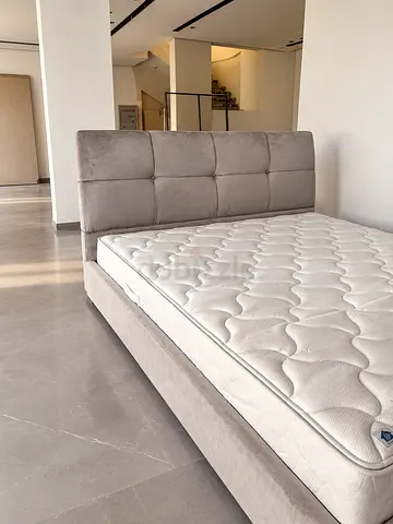 The One king size bed with mattress in excellent condition