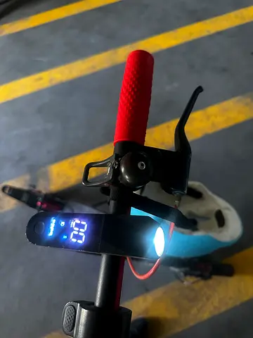 Used electric scooter (working lights and display) - good condition without charger.