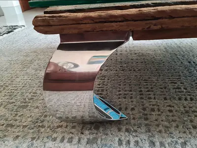 Marina homes.Solid reclaimed wood coffee table with  stainless steel curved legs