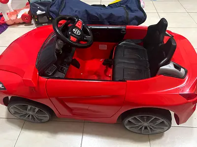 Red 2-Seater Electric Ride-On Car for Kids - Good Condition