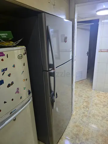 Used stainless steel refrigerator - good working condition