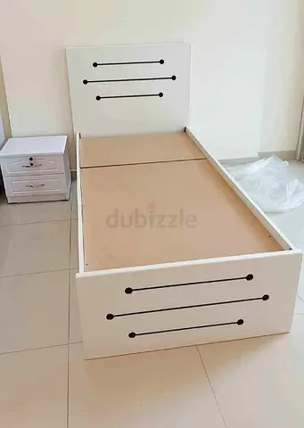 Single white wooden bed frame with matching bedside table - good condition