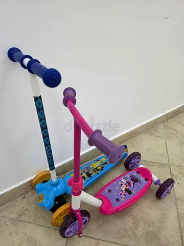 Pair of kids 3-wheel scooters (blue and pink) - good used condition