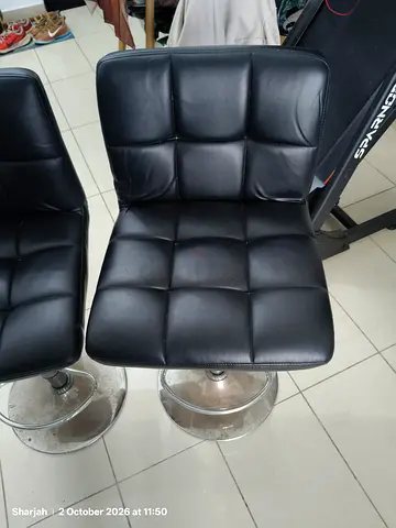 Pair of Black Leather Bar Stools with Swivel Base