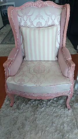 Vintage pink carved accent armchair with patterned upholstery