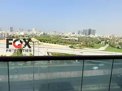 Cash Sale! Furnished apartment in City Towers B2 Ajman. 1,236 sqft, 2 balconies, garden view. Price: