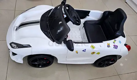 White Electric Ride-On Car for Kids — Single Seat, Good Condition