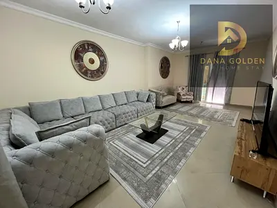For monthly rent: three rooms, two living areas, and three bathrooms in the Al Taawun area, Sharjah.