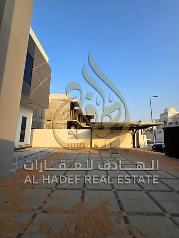 Modern 4BR villa in Al Ghoshi, first tenant, smart home, garden, 5,000 sq ft, 4 payments.