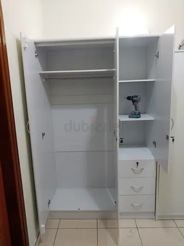 White 3-door Wardrobe with Shelves and Drawers - Good quality