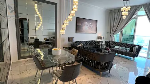 Three bedrooms and a living room in Al Waha Towers, Ajman, with a distinctive view of the creek, gy