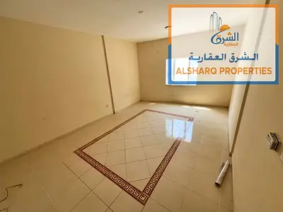 Spacious 1-bedroom apartment with living room, balcony, built-in wardrobes, and central AC in Al Nuaimiya 3 – 26,000.