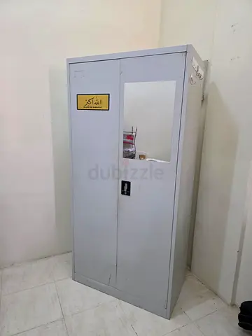 Metal storage cabinet with mirror — sturdy used wardrobe