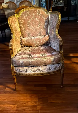 Antique Wingback Accent Armchair with Carved Wood Frame , gold painted work .
