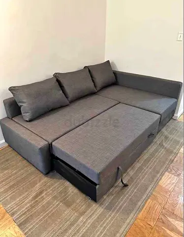 Gray L-shaped Sofa Bed with Pull-out Storage  Good Condition ikea