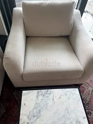 Light beige single armchair in excellent condition