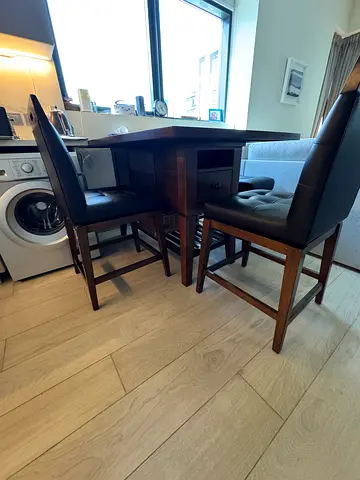 Wooden dining table with 4 cushioned chairs - good condition
