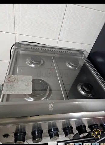 Used 4-Burner Stainless Steel Gas Stove with Glass Lid