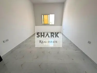 1BR apartment in Al Muwaihat 1, Ajman, second occupancy, 2 bathrooms. AED 34K yearly, payable in 4 installments, security deposit by cheque.