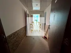 For annual rent in Khor Towers Ajman, 3 BR & hall with sea view, central AC, balcony, 4 baths & maid