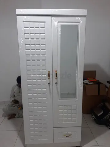 I'm selling brand new 2door cabinet available