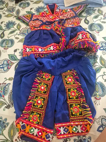 Traditional embroidered blue baby boy dress with colorful trims