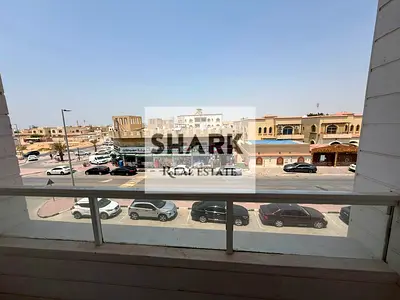 2BR apartment in Al Muwaihat 1, Ajman, second occupancy, 2 bathrooms. AED 38K yearly, 4 installments, deposit by cheque.