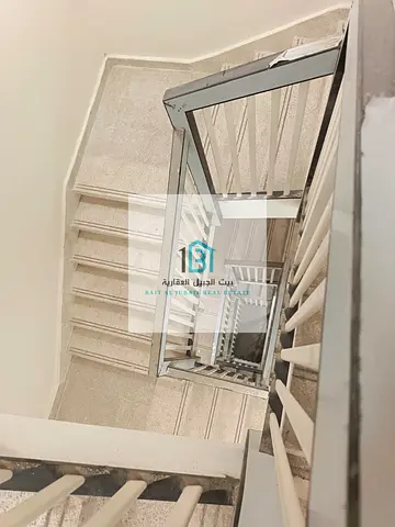 Brand-new residential building in a prime location in Tilal, situated on a 36-meter front road and a 24-meter rear road.
