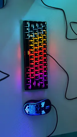A mechanical keyboard 60% black with rgb and come with tanker mouse rgb
