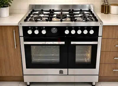La Germania dual oven gas and electric 5 burner cooker same like new condition for sale