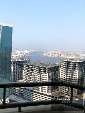 A two-bedroom apartment with a living room is available for annual rent in the Horizon Towers, Al Rashidiya (located above the Cooperative Society). I