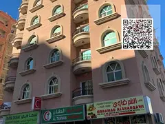 One bedroom and living room in Rashidiya 3, on the main traffic street, with 2 bathrooms, large area