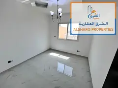 A spacious, two-bedroom apartment with a living area, featuring a practical and comfortable layout a
