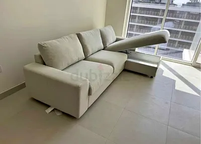Light beige sofa bed with storage, like-new