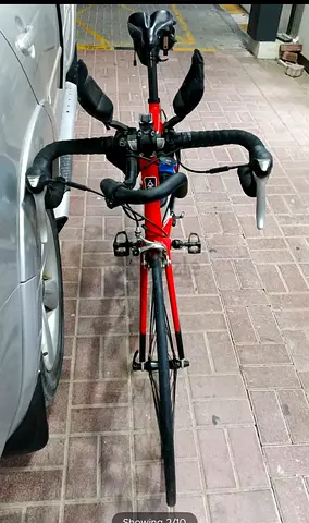 Red road/triathlon bike with aero bars - used