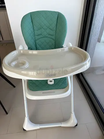 Evenflo adjustable baby high chair in green - good condition