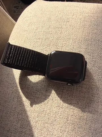 Used Apple Watch SE 3 (black) with nylon loop band - good condition
