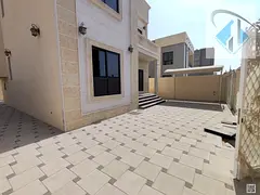 Villa for rent with a large yard and a carport.