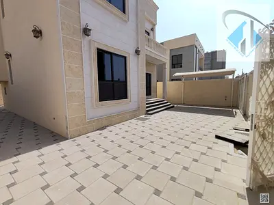 Villa for rent with a large yard and a carport.